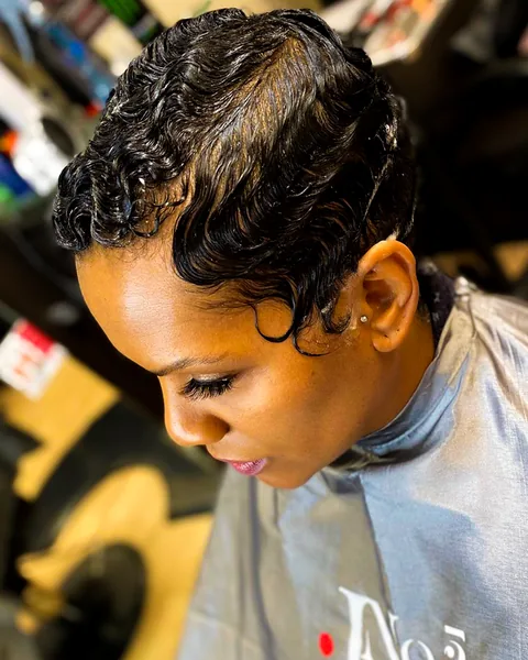 Close view of sculpted finger waves in a short hairstyle